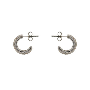 
                  
                    Load image into Gallery viewer, These earring are made in sterling silver and 5 rows of pave-set crystals. This hoops are 14mm wide and 3.1mm thick. Displayed side facing on a marbled background.
                  
                