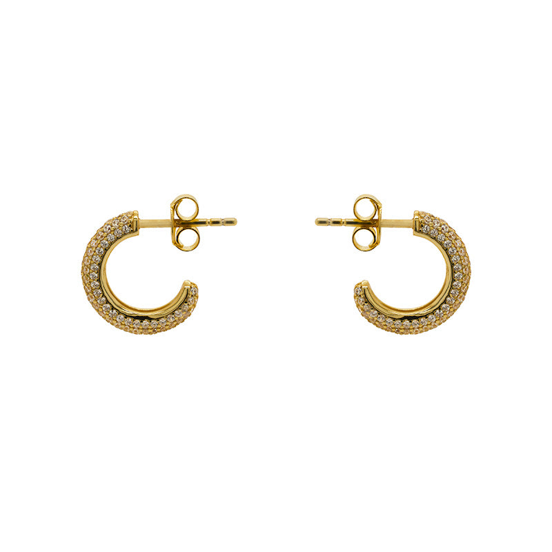 These earring are made in sterling silver with 14kt gold plating and 5 rows of pave-set crystals. This hoops are 14mm wide and 3.1mm thick. Displayed side facing on a marbled background.