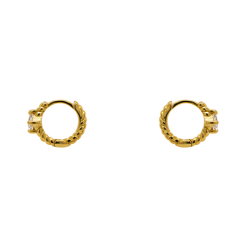 
                  
                    Load image into Gallery viewer, A pair of twist pattern style huggie earrings with princess cut crystals made of 14 kt yellow gold vermeil. Displayed side facing on a white background.
                  
                