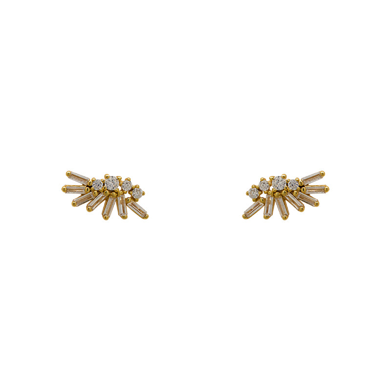 A pair of 14 kt yellow gold vermeil cluster studs with 4 round and 7 baguette crystals on each stud, and on a white backgtround.