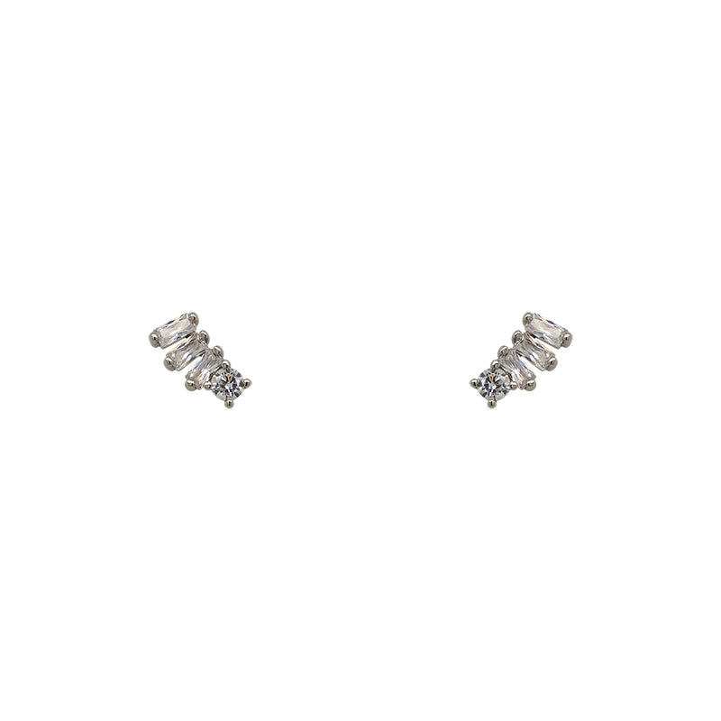 A pair of 925 sterling silver round and triple baguette cut crystal stud earrings on a white background.