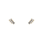 A pair of 14 kt yellow gold vermeil round and triple baguette cut crystal stud earrings on a white background.