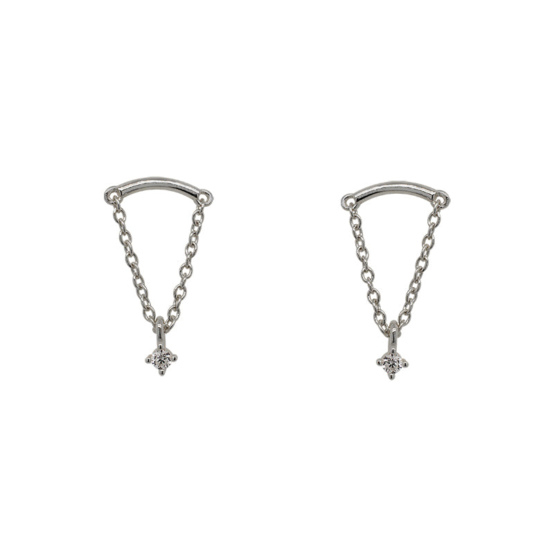 A pair of arch shaped studs with chain and a dangling crystal. Made of 925 sterling silver.