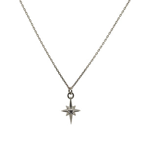 
                  
                    Load image into Gallery viewer, Petite size north star charm necklace with a tiny diamond in the center made of solid 14 kt white gold.
                  
                