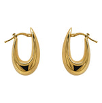 A pair of wide, hollow, 14 kt yellow gold latch back hoops that taper from the bottom up and on a white background.