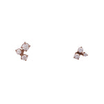 Front view on white background of cluster-style diamond studs in 14 kt rose gold. Total carat weight of varied round diamonds are 0.27 ct.