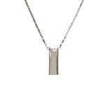 Front view of NS plain sterling silver rectangle pendant suspended from an elongated box chain.