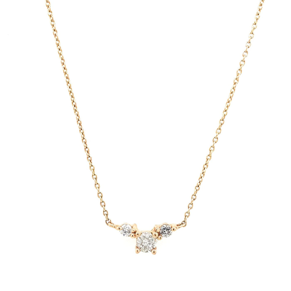 Front view of a necklace with three gray diamonds set in a 14 kt yellow gold setting.