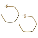 Side view of hexagon shaped hoop earrings made of solid 14 kt yellow gold. Displayed on white background.