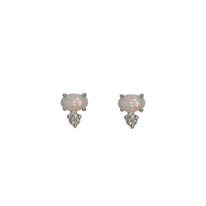 
                  
                    Load image into Gallery viewer, Front view of white oval opals, set east-west in 14 kt white gold with 1 round accent diamond set vertically below each. Displayed on white background.
                  
                