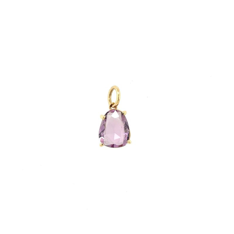 
                  
                    Load image into Gallery viewer, A front view of a large purple pear sapphire set in yellow gold shown on a white background.
                  
                