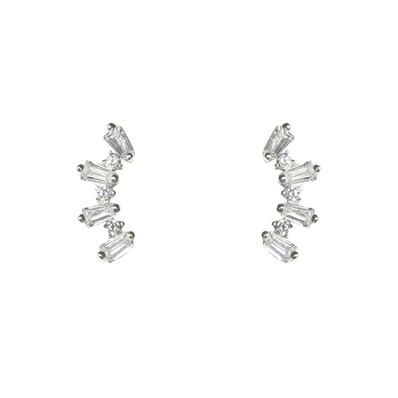 A pair of sterling silver studs with baguette and round cut crystals shown on a white background.