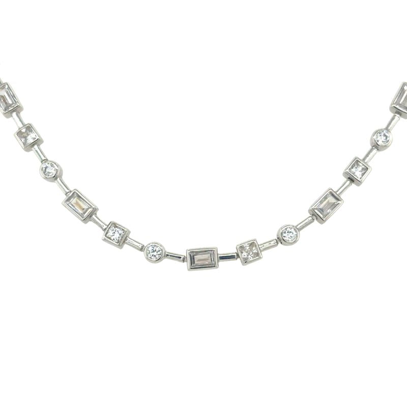 A front view of alternating round, rectangle, and square bezel set crystals shown on a white background.