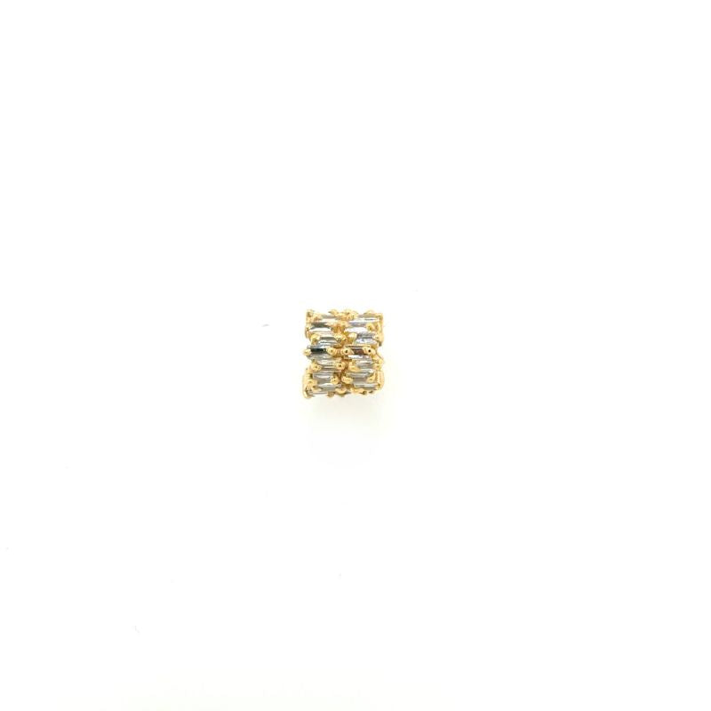 A front view of a staggered diamond baguette rondel set in 14kt yellow gold shown on a white background.