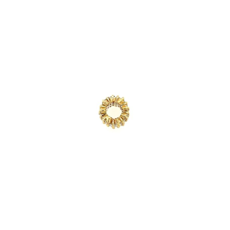 A front view of a staggered diamond baguette rondel set in 14kt yellow gold shown on a white background.