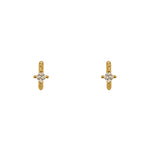 A pair of twist pattern style huggie earrings with princess cut crystals made of 14 kt yellow gold vermeil. Displayed forward facing on a white background.