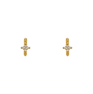 
                  
                    Load image into Gallery viewer, A pair of twist pattern style huggie earrings with princess cut crystals made of 14 kt yellow gold vermeil. Displayed forward facing on a white background.
                  
                