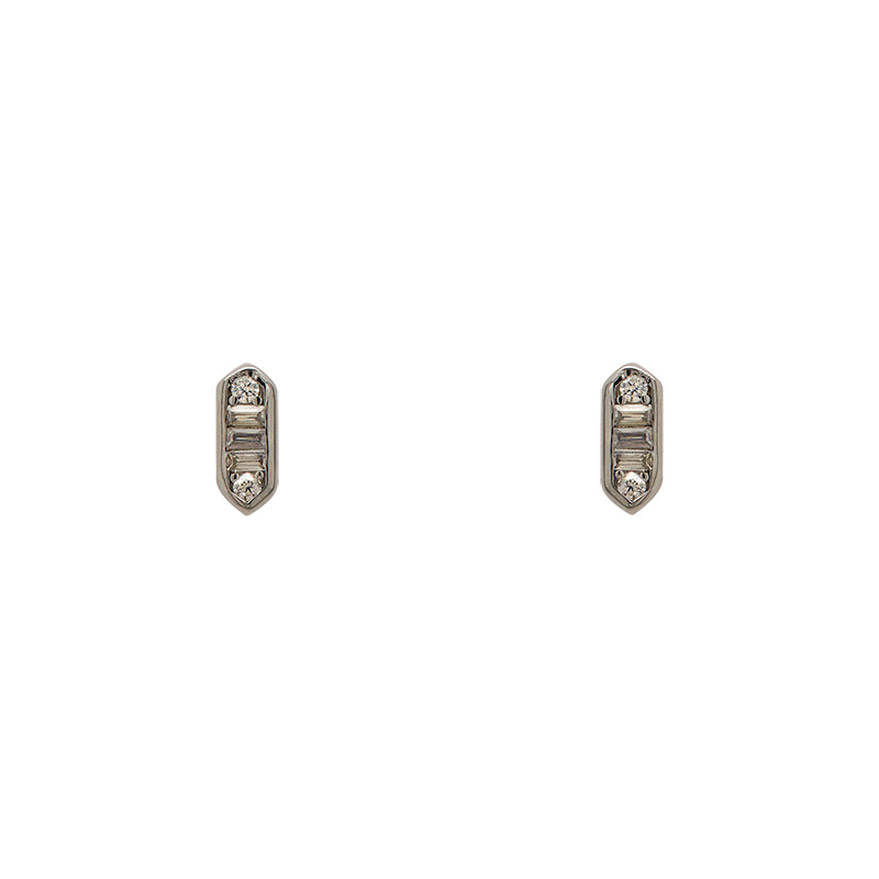 A pair of 925 sterling silver, hexagonal shaped studs with round and baguette cut AAA crystals on a white background.