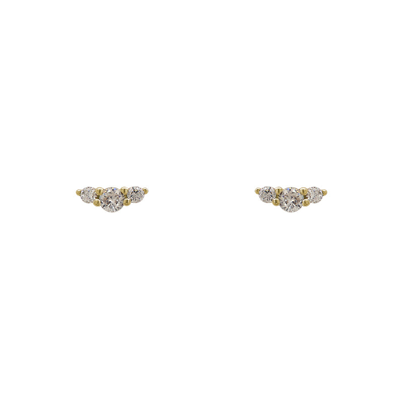 A pair of 14 kt yellow gold vermeil round triple crystal studs on a white background.