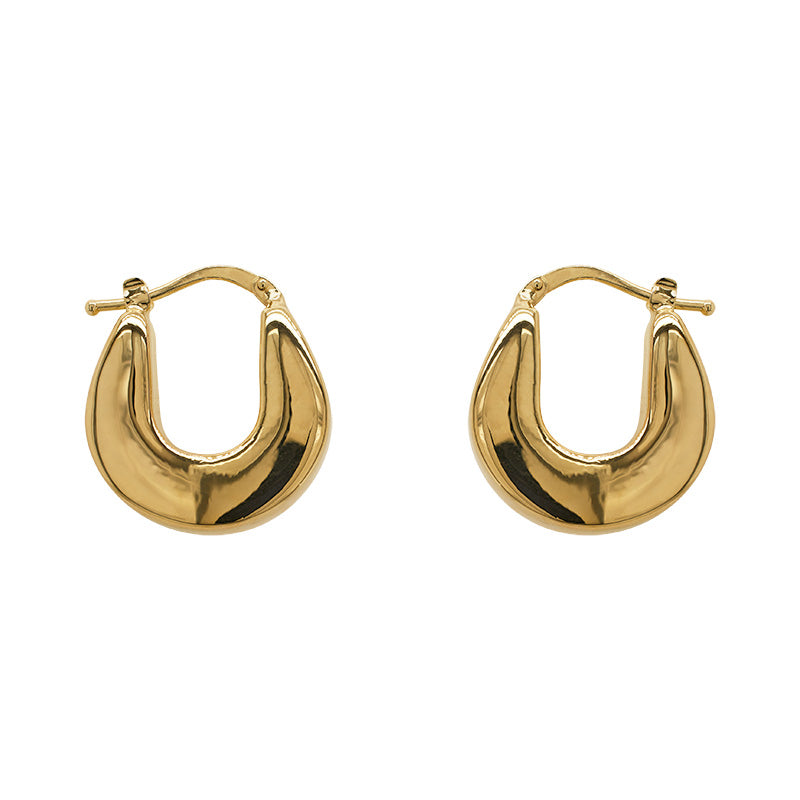 A pair of wide, hollow, 14 kt yellow gold latch back hoops on a white background.