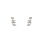 Sterling silver  statement earrings containing  pear, baguette and round cut crystals. Displayed on a white background.