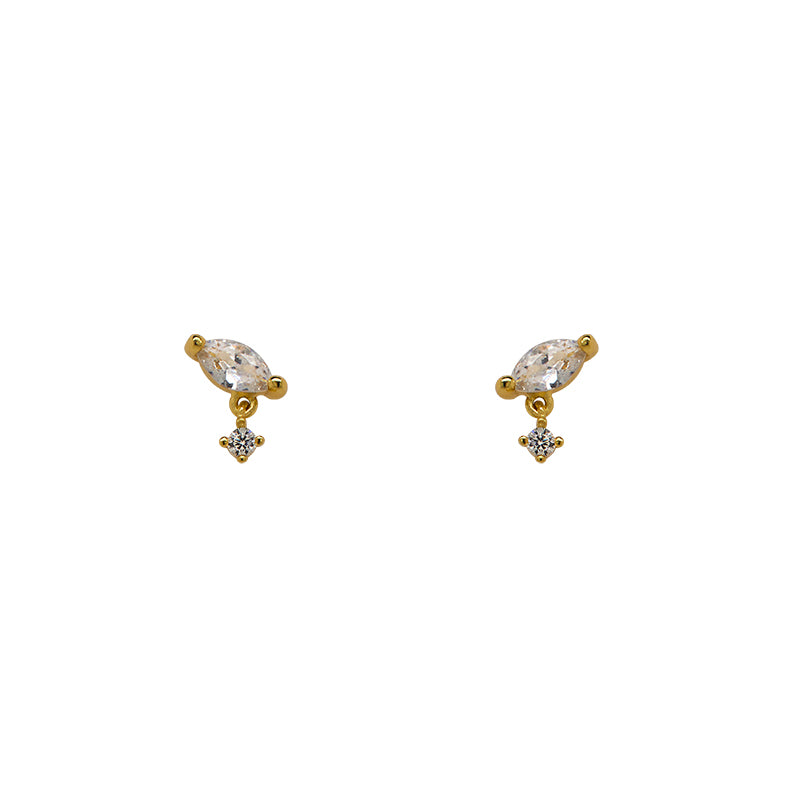 A pair of marquise cut crystal studs, set east/west with a small round crystal dangling close below and set in 14 kt yellow gold vermeil.