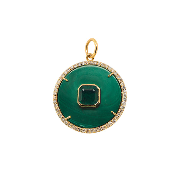 Round malachite pendant surrounded by over a quarter carat of white diamonds with an emerald cut emerald in the center, and cast in 14 kt yellow gold.