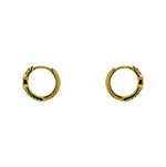 Huggie style earrings made of 14 kt yellow gold vermeil with round and marquise cut green crystals. Displayed side facing on a white background.