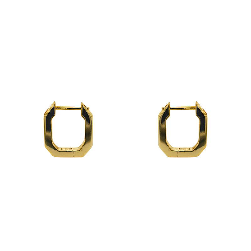 
                  
                    Load image into Gallery viewer, Geometric shaped hoop earrings made of 925 sterling silver with 14 kt yellow gold vermeil. Hoops have tiny baguette crystals set on one side. Displayed side facing and on a white background.
                  
                