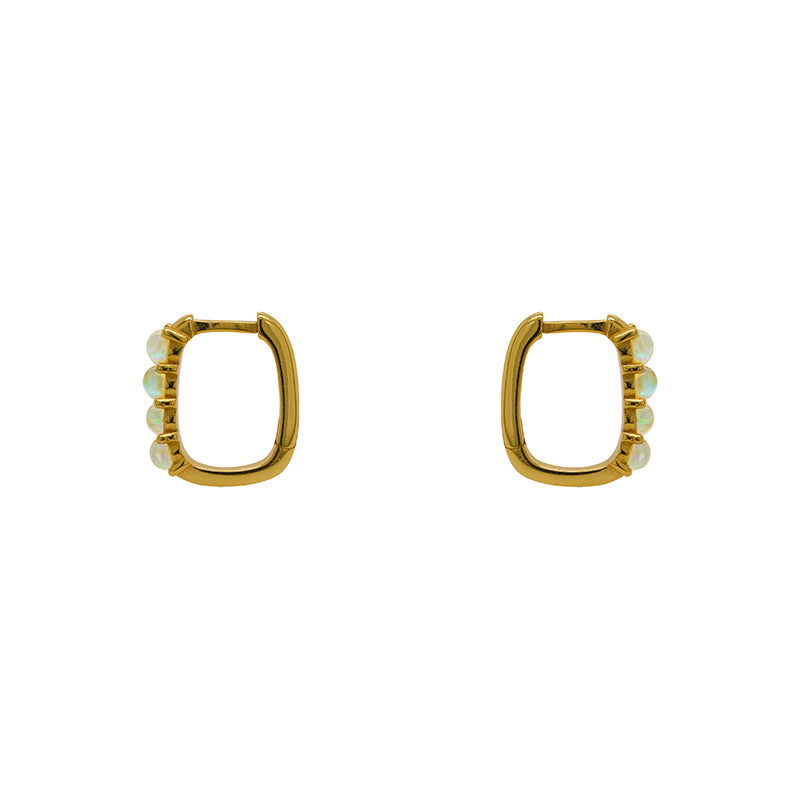 Four faux opal hoop earrings in 14 kt yellow gold vermeil. Hoops are side facing and displayed on a white background.