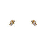 A pair of 14 kt yellow gold vermeil cluster studs each containing one marquise, one round and one baguette crystal on a white background.