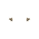 A pair of cluster studs composed of 2 round  crystals and 1 smaller round crystal in 14k t yellow gold vermeil settings.