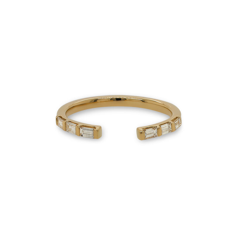 Front view of an open ended band with 6 baguette cut diamonds and cast in 14 kt yellow gold.