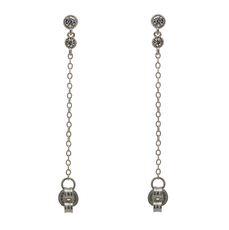 
                  
                    Load image into Gallery viewer, A pair of milgrain, bezel set round crystal studs with a smaller hanging bezel set crystal and chain connected to the earring back, and made of 925 sterling silver.
                  
                