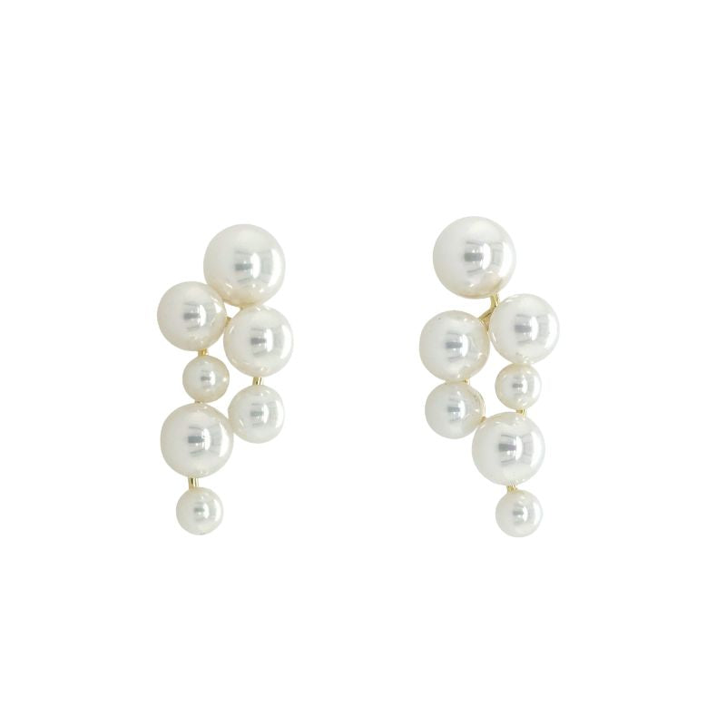 A front view of drop stud pearl clusters shown on a white background