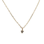 Front view of a 2.1 mm diamond pendant necklace cast in 14 kt yellow gold.