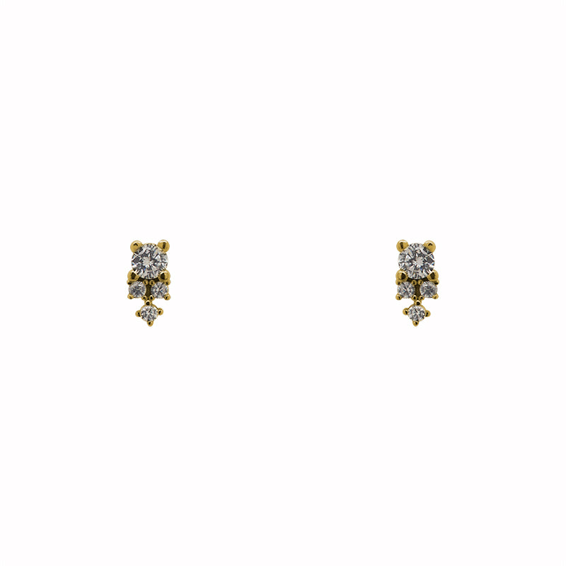 Stud earrings made of 14 kt yellow gold vermeil. Each stud has one larger and 3 smaller crystals that form a cluster.