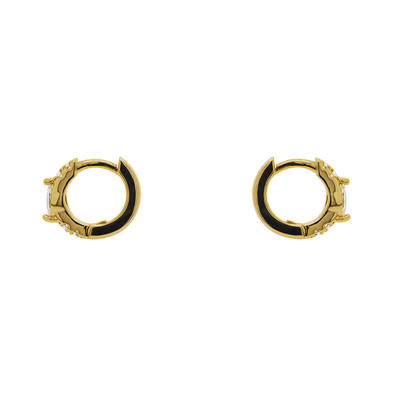 
                  
                    Load image into Gallery viewer, Ear Huggie style earrings with round crystals and one marquise crystal in a 14kt yellow gold vermeil setting. Displayed side facing on a white background.
                  
                