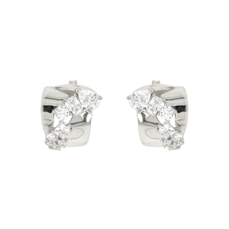 A pair of sterling silver statement studs with mixed cut crystals scattered through the middle. Shown on a white background.
