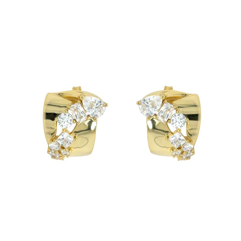 A pair of yellow gold statement studs with mixed cut crystals scattered through the middle. Shown on a white background.