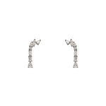Sterling silver  drop earrings containing pear, baguette and round cut crystals. Displayed on a white background.