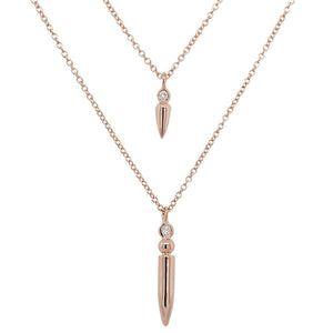 
                  
                    Load image into Gallery viewer, Front view of one small diamond spike necklace and one large diamond spike necklace cast in 14 kt rose gold.
                  
                