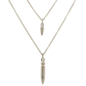 
                  
                    Load image into Gallery viewer, Front view of one small diamond spike necklace and one large diamond spike necklace cast in 14 kt white gold.
                  
                