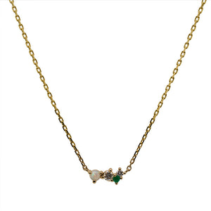
                  
                    Load image into Gallery viewer, Front view of an asymmetrical cluster necklace set with a cabachon opal, one round emerald and two round diamonds. Set in 14 kt yellow gold.
                  
                