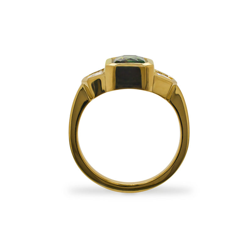 
                  
                    Load image into Gallery viewer, Through the finger view of an emerald cut, green sapphire and Cadillac cut diamond ring cast in 18 kt yellow gold.
                  
                