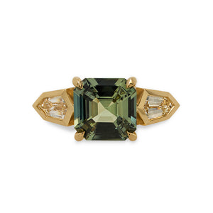 
                  
                    Load image into Gallery viewer, Front view of a prong set, asscher cut, green sappihire and bezel set shield cut diamond ring in an 18 kt yellow gold setting.
                  
                