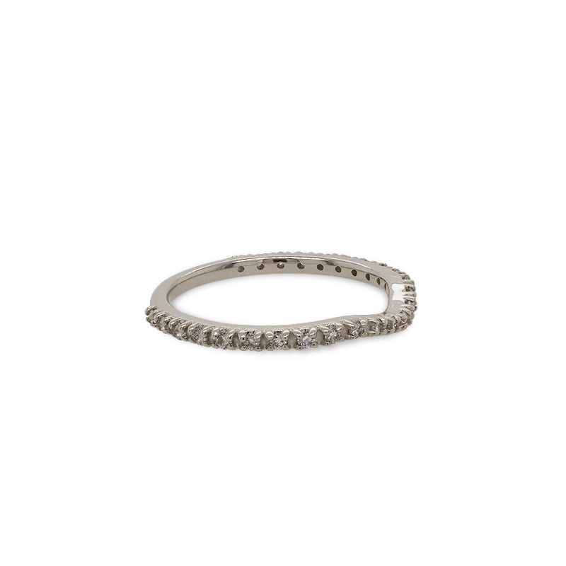 
                  
                    Load image into Gallery viewer, Side view of a dainty shadow band with a subtle dip in the center that has 25 small, prong set diamonds in a 14 kt white gold setting.
                  
                