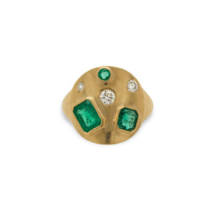 
                  
                    Load image into Gallery viewer, Front view of a signet style ring cast in 14 kt yellow gold with a matte finish, sprinkled with 3 different sizes of round cut diamonds, 1 round cut emerald, one asscher cut  and one emerald cut emerald on a white background.
                  
                
