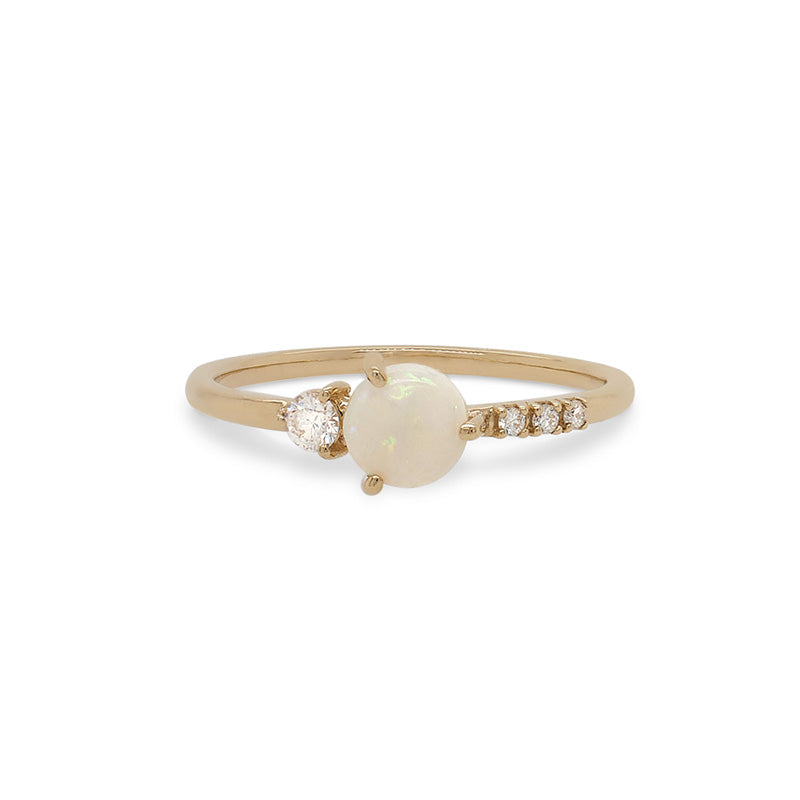 
                  
                    Load image into Gallery viewer, Front view of an asymmetrial ring with a center opal flanked by 3 small round diamonds and 1 medium size round diamond cast in 14 kt yellow gold by King + Curated.
                  
                