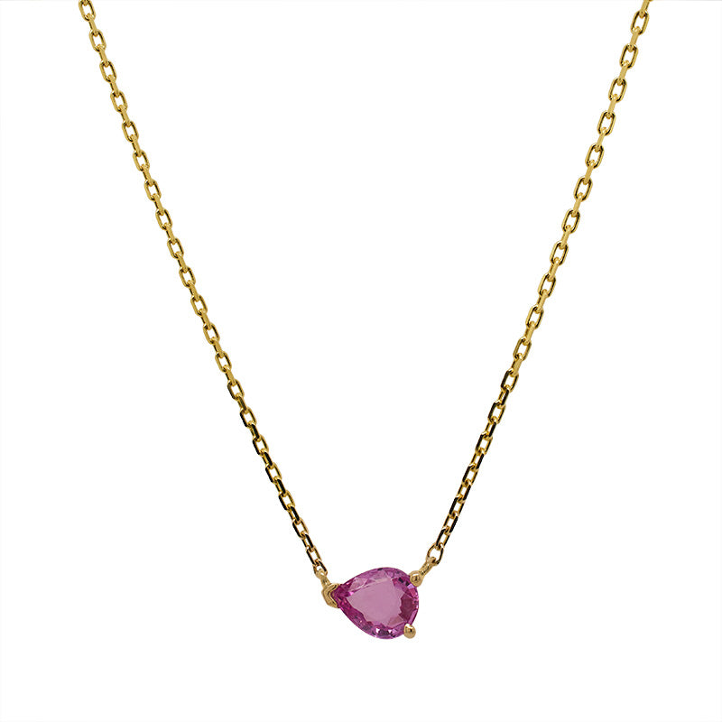 An east west set pink, pear cut sapphire necklace set in a 3 prong 14 kt yellow gold setting on a white background.